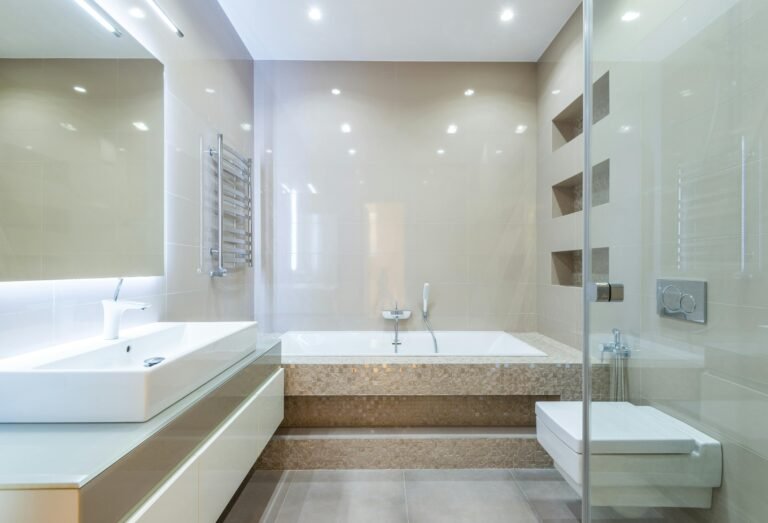 Spotless bathroom with clean surfaces and fresh towels