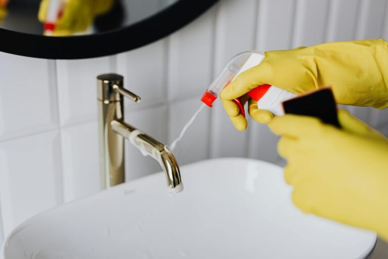 cleaning bathroom sink - showing mess2miracles deep cleaning in new york city